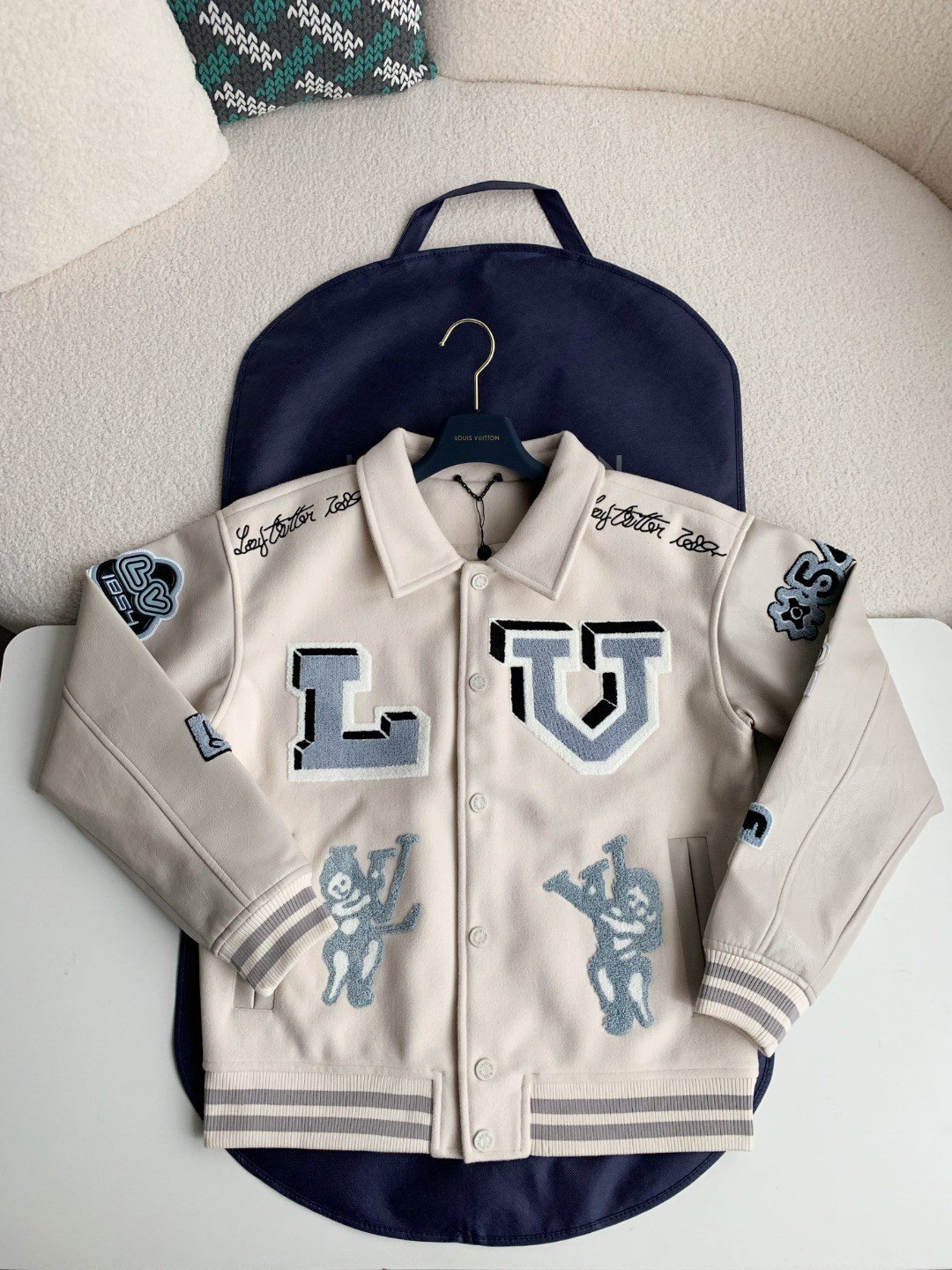 L X V Varsity JacketsSUNGLASSES
